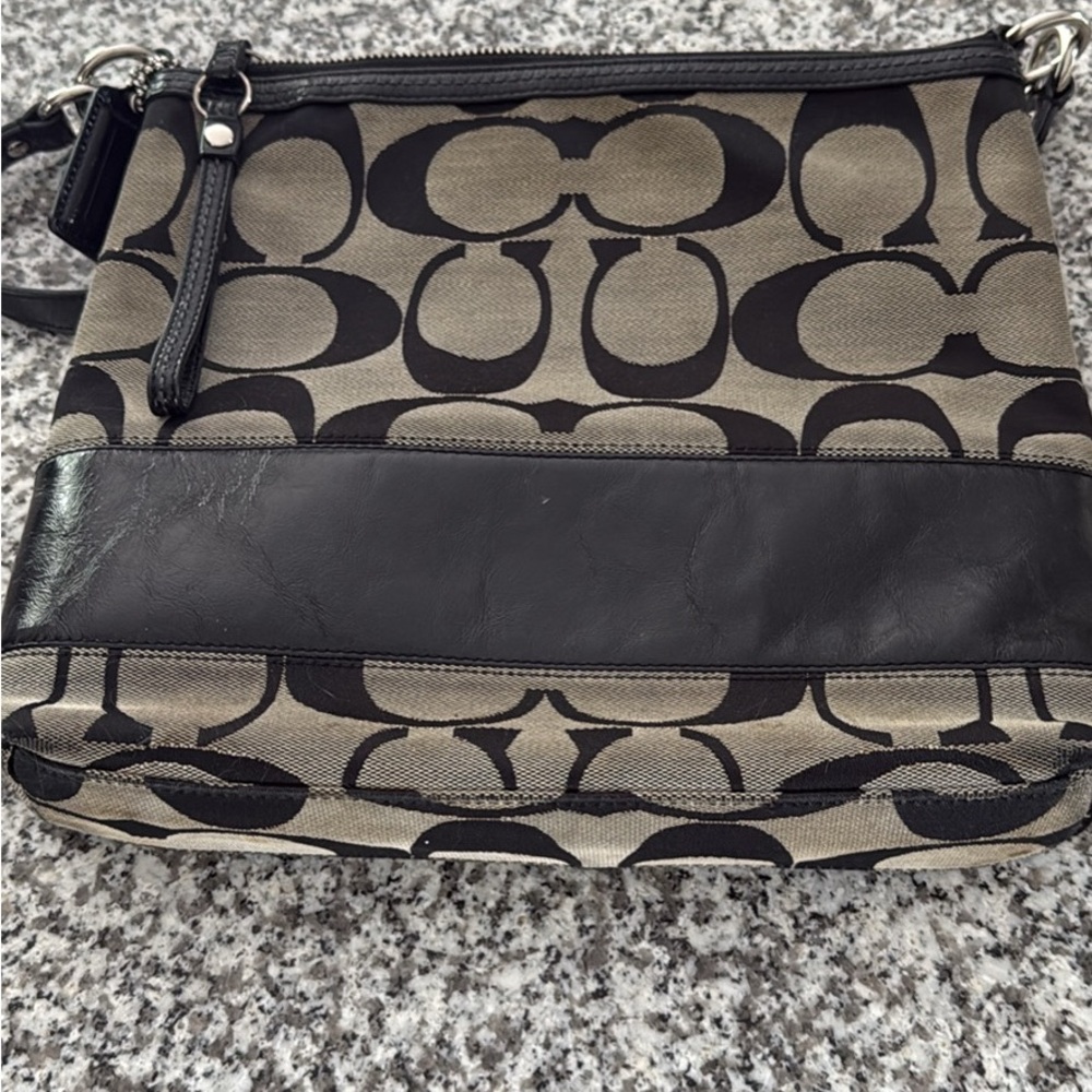 Coach Signature Black and Tan bag. Retail 298.00